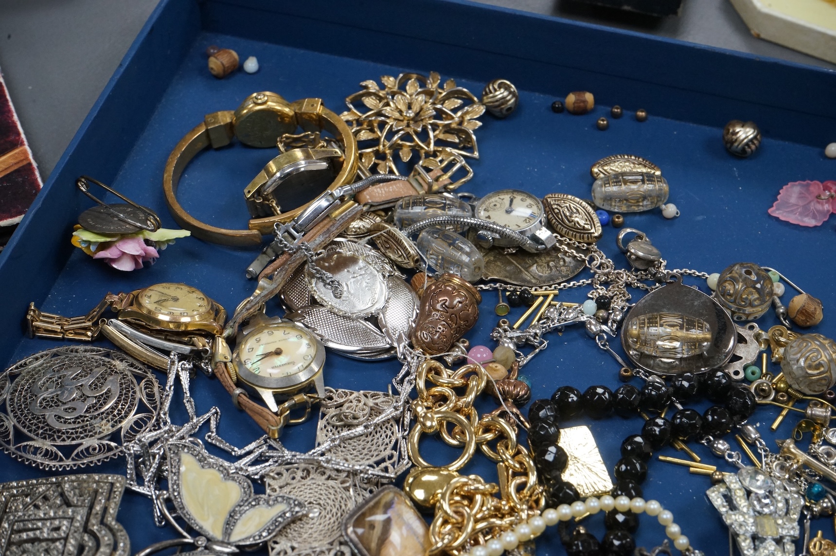 A quantity of assorted costume and other jewellery, including filigree white metal bracelet, paste cluster set clip brooch, Scottish silver twin hearts brooch, etc., together with four assorted lady's wrist watches.